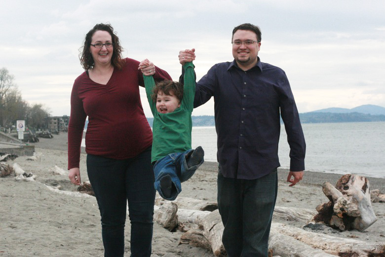 swinging big boy — family maternity photo shoot on the beach