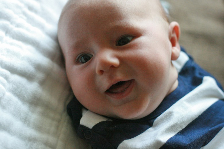 newborn baby Alrik 2mo a2mo smiling