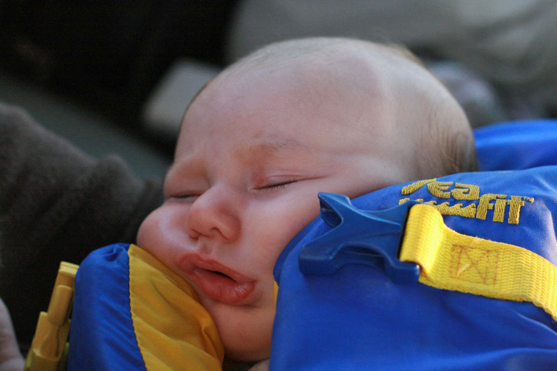 Liberty Bay boating outdoors — alrik newborn anb asleep in life jacket