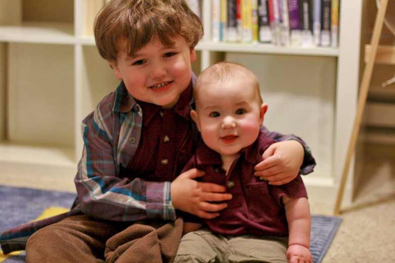 boy and baby in Fuerte polo shirts, Fiesta plaid shirt, Surplus Playwear Pants — Tea Collection giveaway
