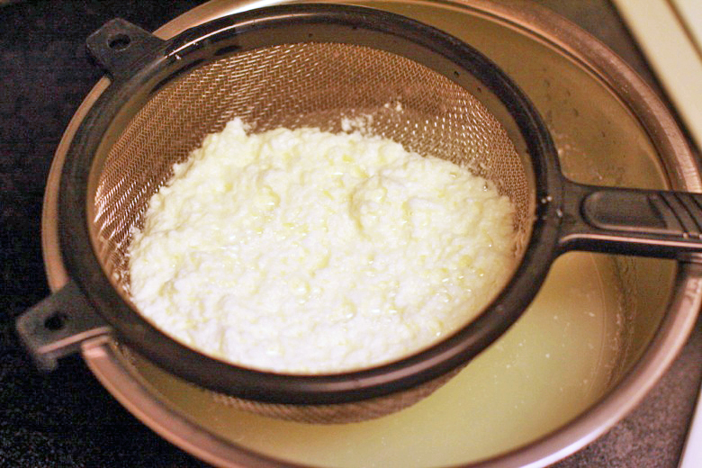 strainer to separate curds and whey - homemade ricotta cheese recipe