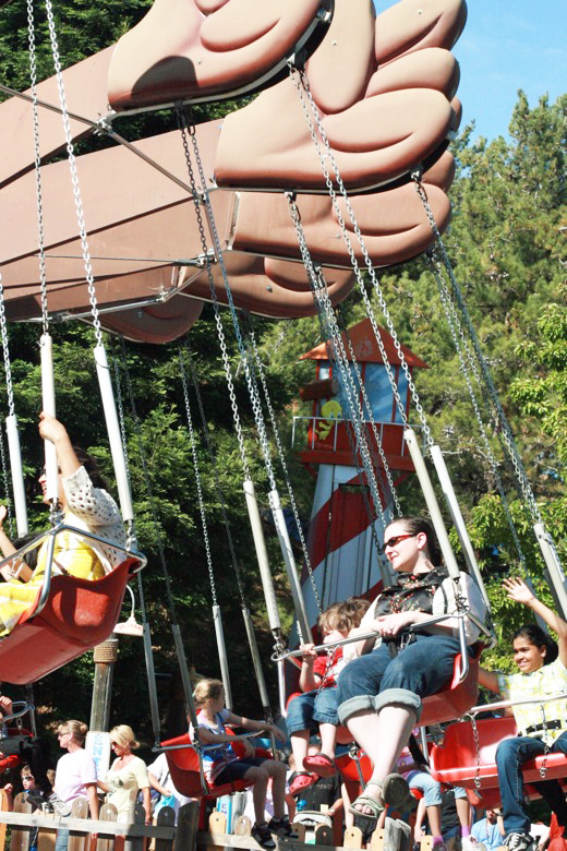 mom and son on amusement park swing ride &#8212;&nbsp;Six Flags California