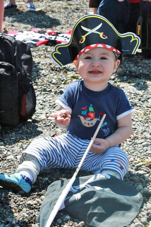 baby pirate boy in sand &#8212; Seafair Pirates Landing Alki Beach Seattle summer 2012