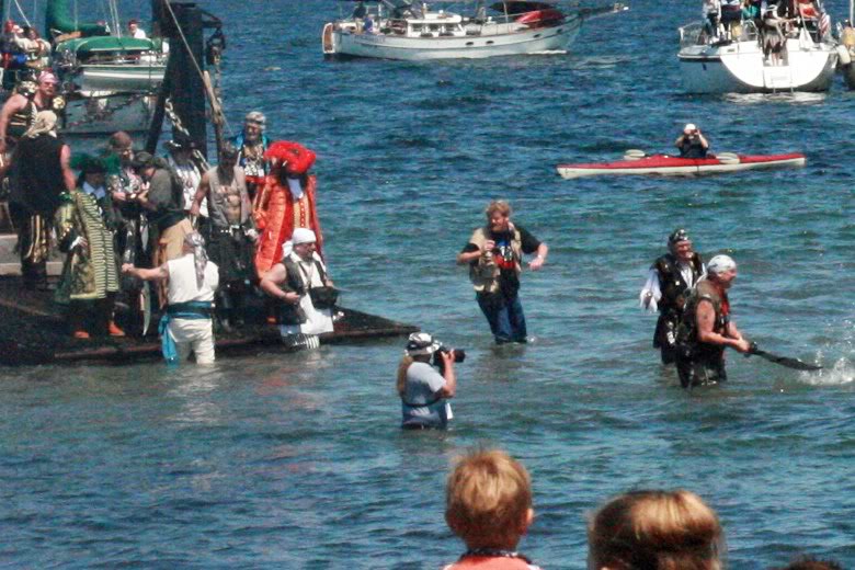 pirates coming ashore off boat &#8212; Seafair Pirates Landing Alki Beach Seattle summer 2012