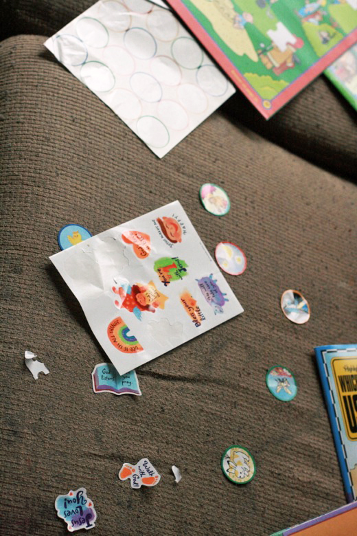 toddler's sticker artwork on the couch - crafts art