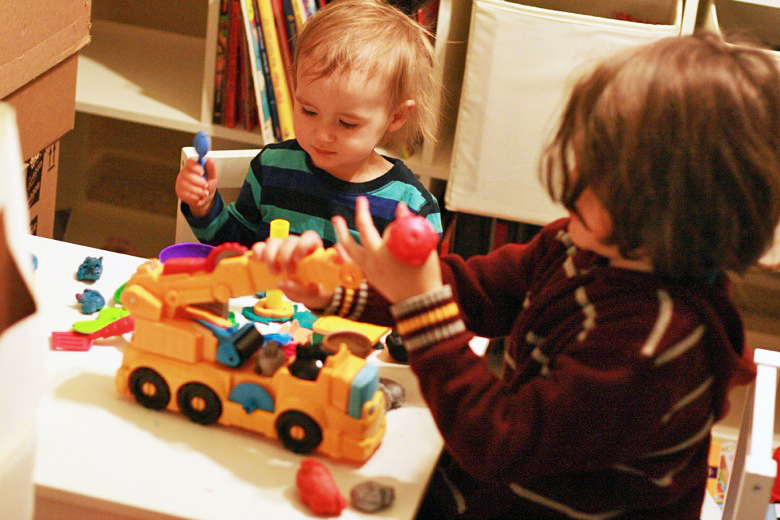 brothers playing with play dough play-doh - crafts art