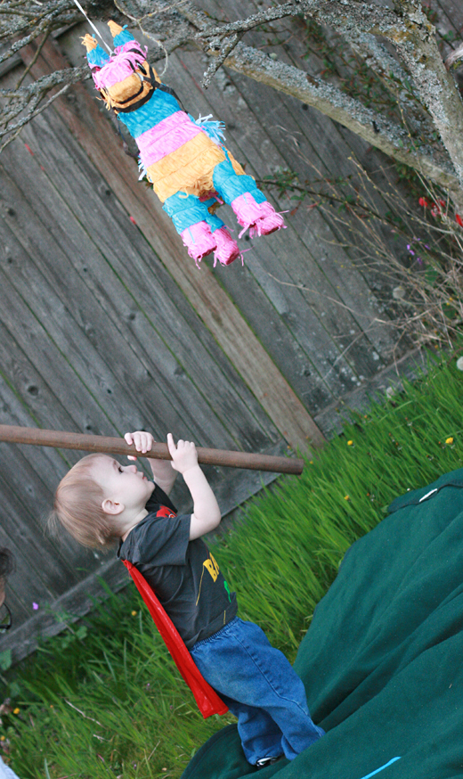 toddler boy hitting pinata - Easter 2013 holidays