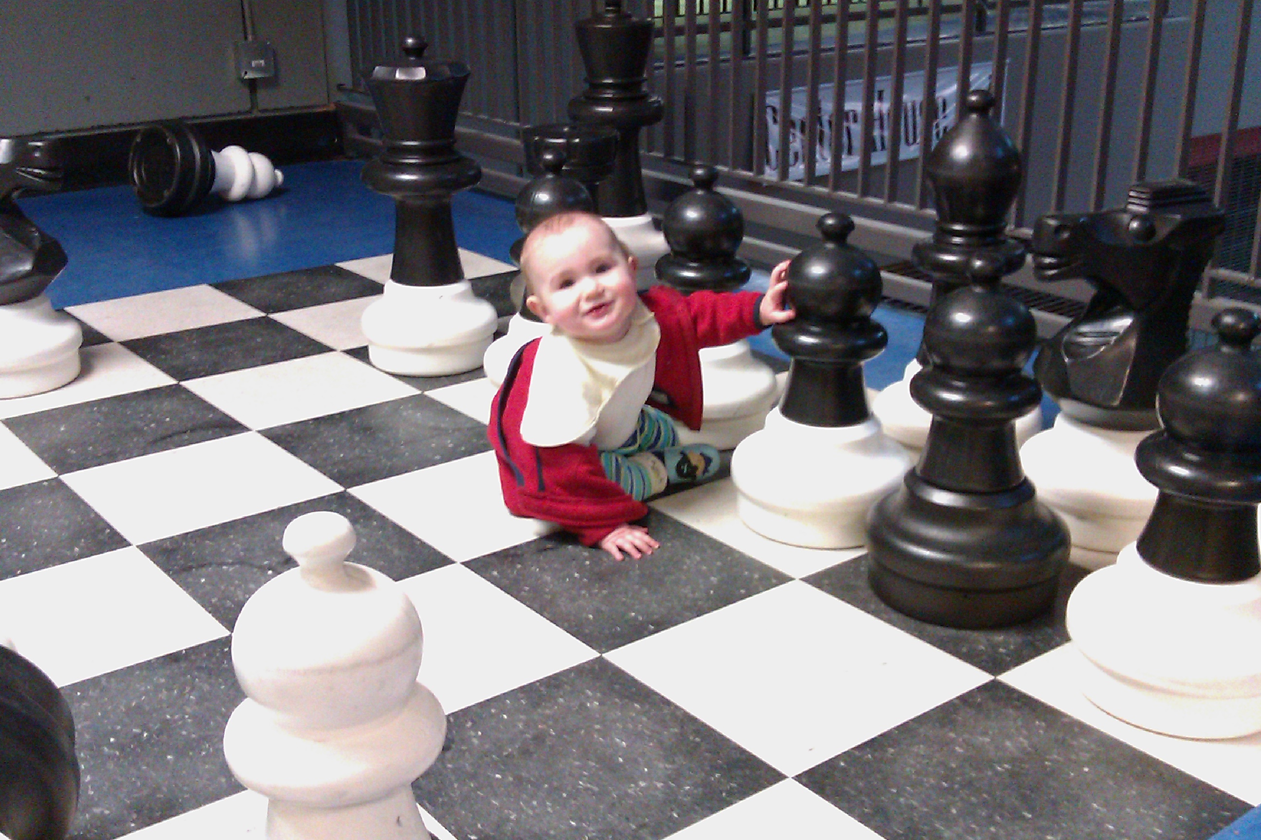 baby on giant chess board