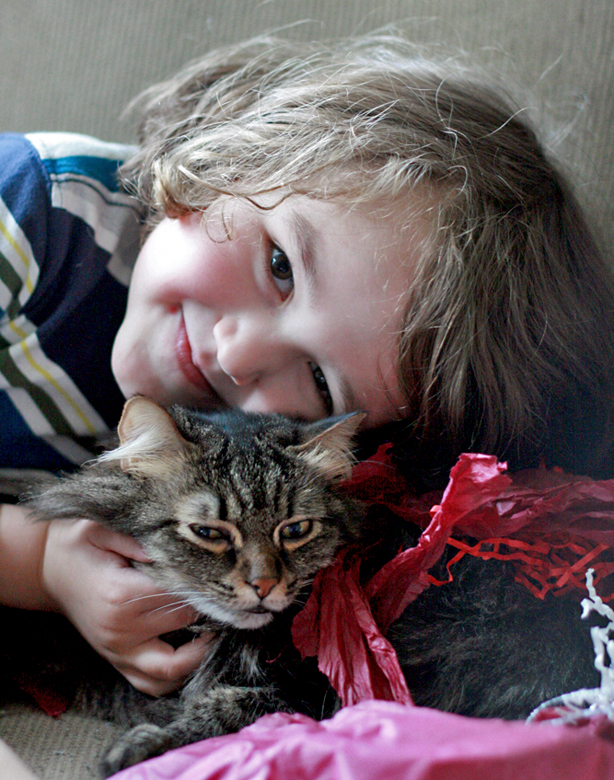 sweet boy hugging cat - valentine's day 2013