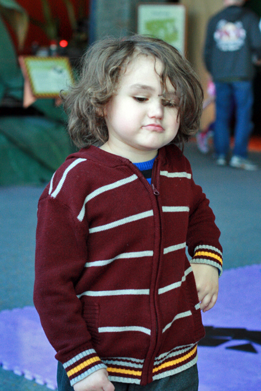 boy looking chill - pacific science center outing seattle unschooling