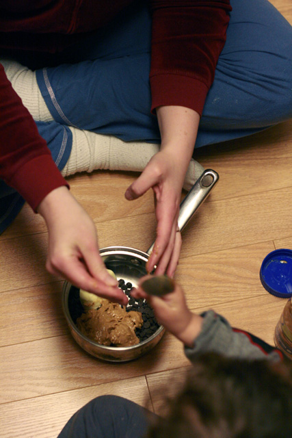 cooking on the floor with a child