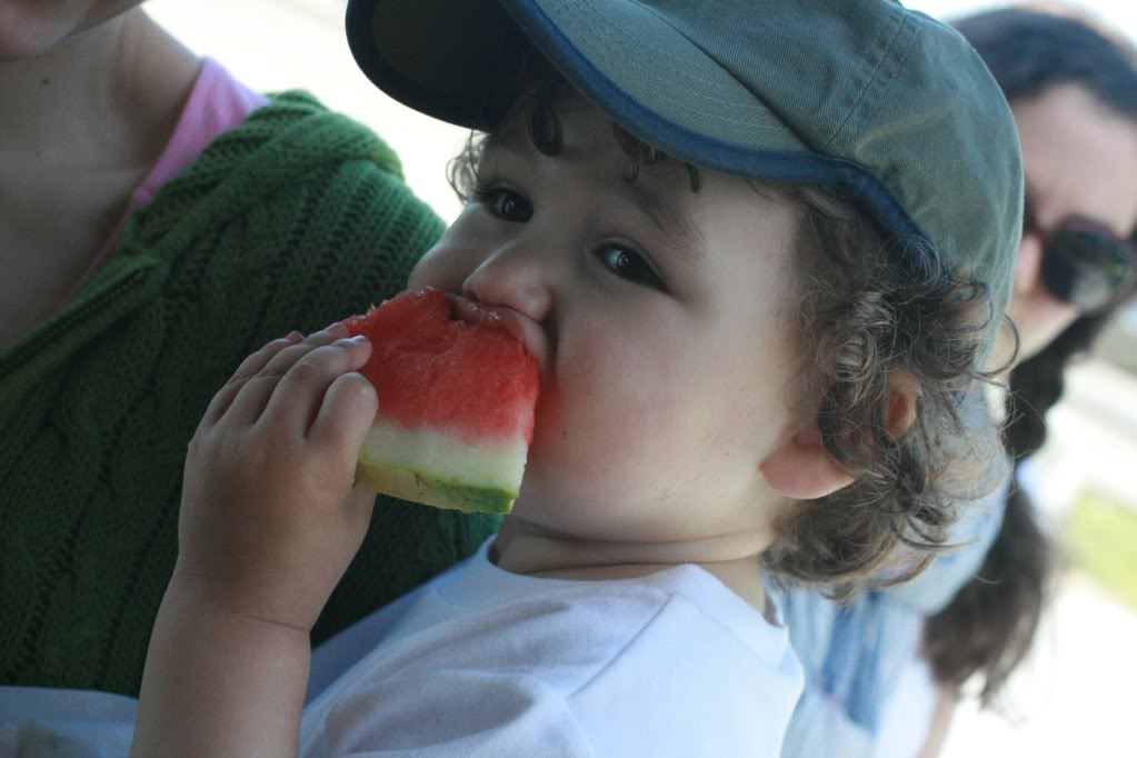 toddler eating watermelon