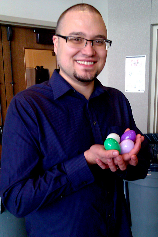 dad holding eggs in hand basket