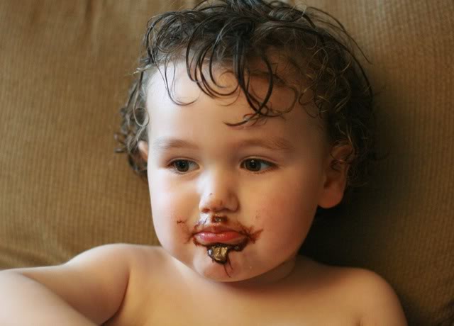 1 toddler with Nutella face