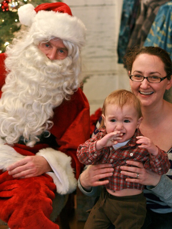 baby not sure — visiting Santa for pictures