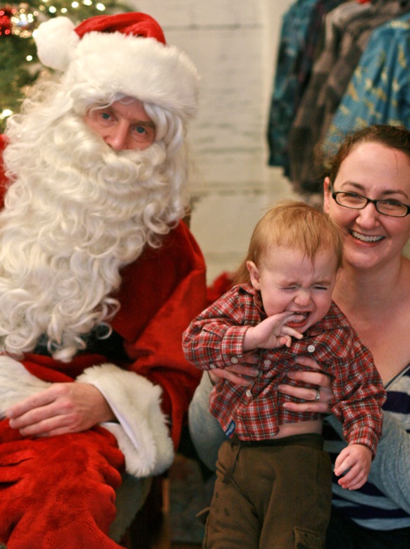baby crying — visiting Santa for pictures
