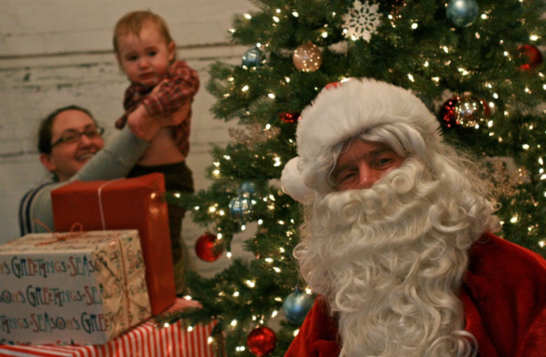 baby popping up — visiting Santa for pictures